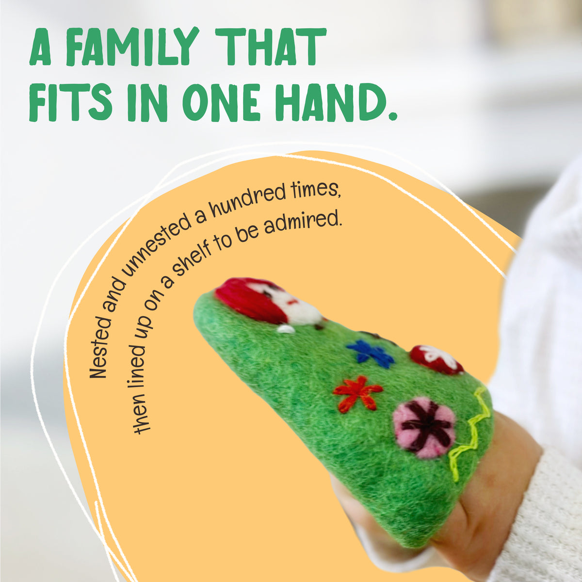 Childhand inside the OmaOmaOma felted wool babushka nesting dolls showing scale.