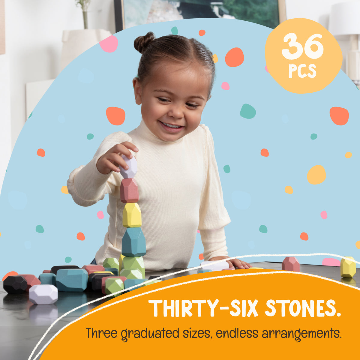 Toddler stacking a tower with the OmaOmaOma wooden balance stones — Waldorf-inspired play in FSC-certified wood